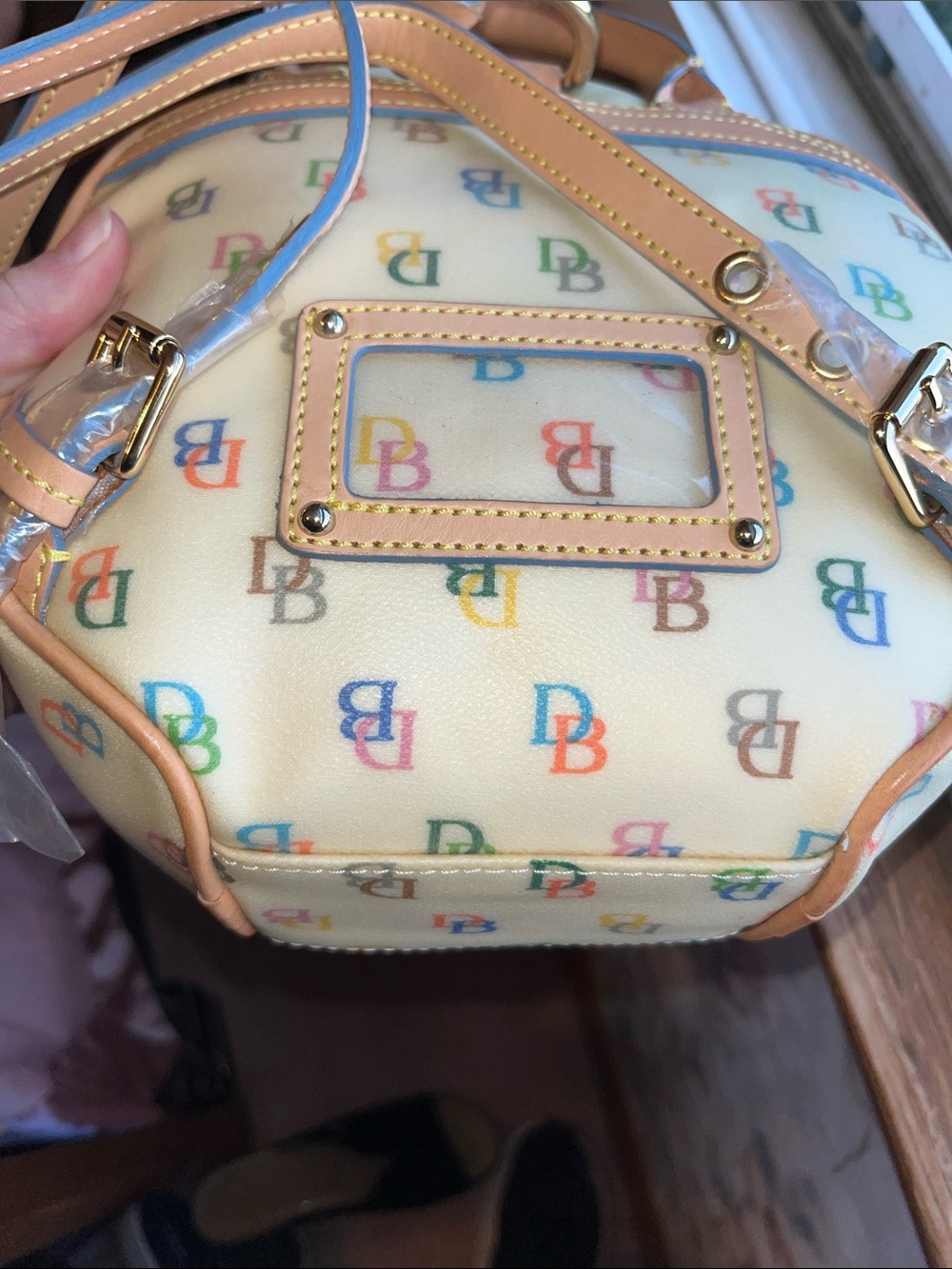 NWT Dooney & Bourke Cream Multicolor Logo Coated Canvas Backpack with Tan Trim - Picture 11 of 14